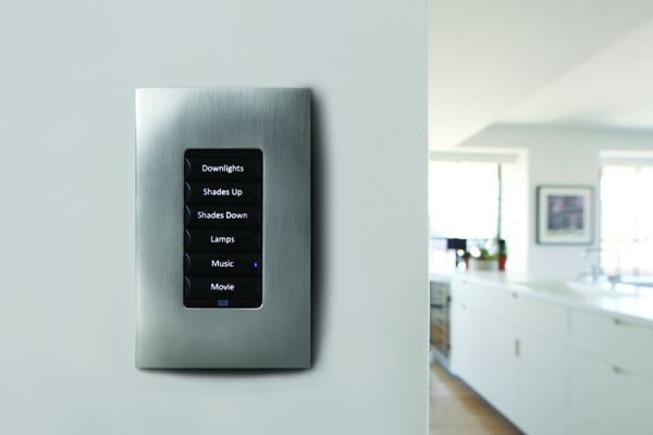 Control4 lighting keypad mounted on a wall
