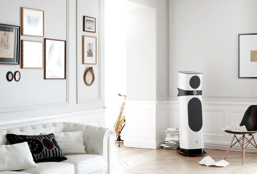 A living space featuring a Focal standing speaker in the center.