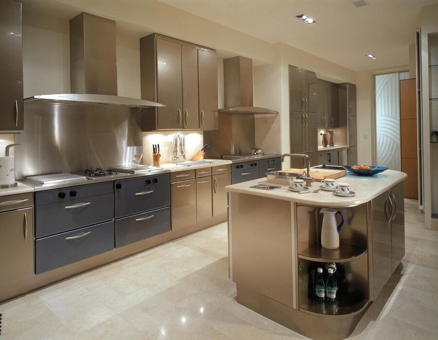 A kitchen space illuminated by Lutron lighting control fixtures.