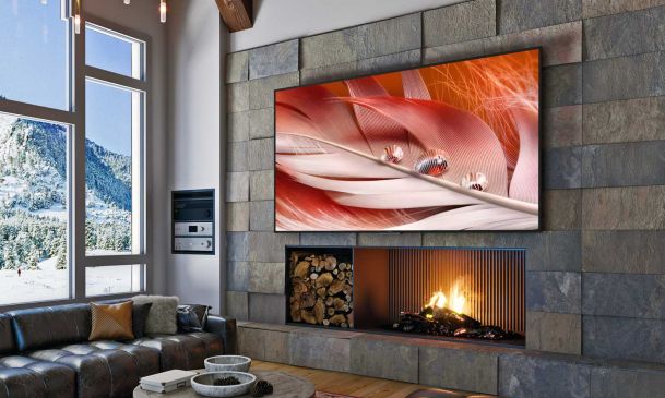 sony living area with stone wall