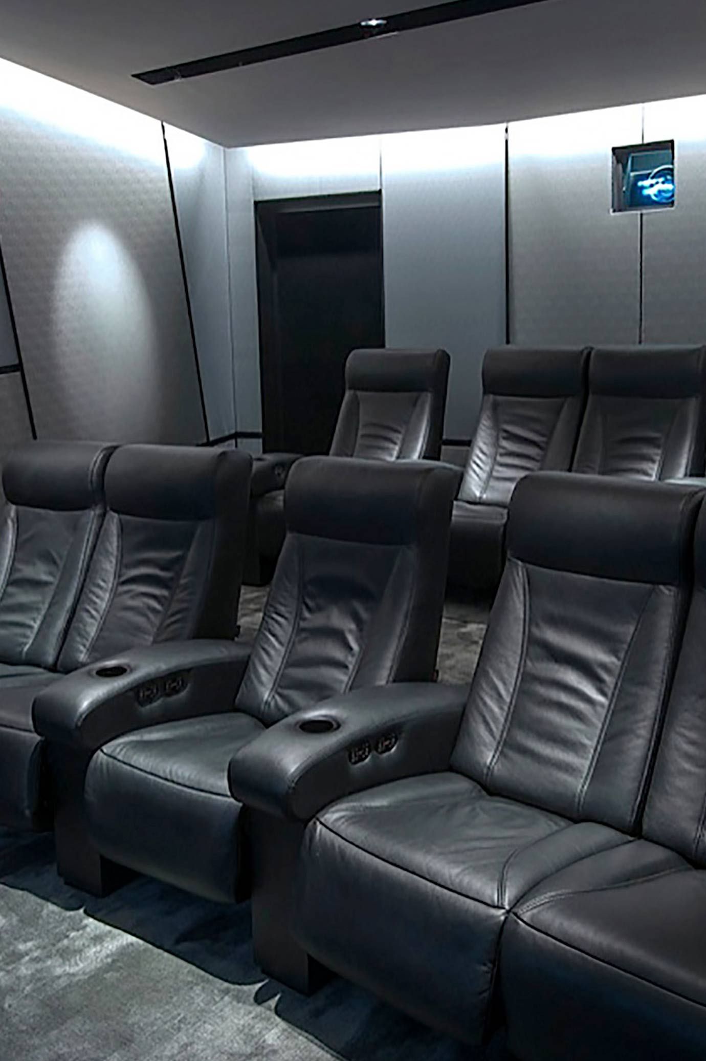 Black leather chairs in a home theater