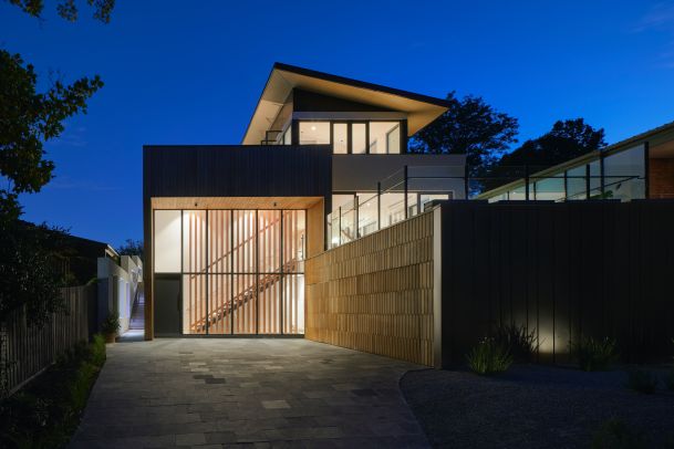 modern home at dusk that's lit up