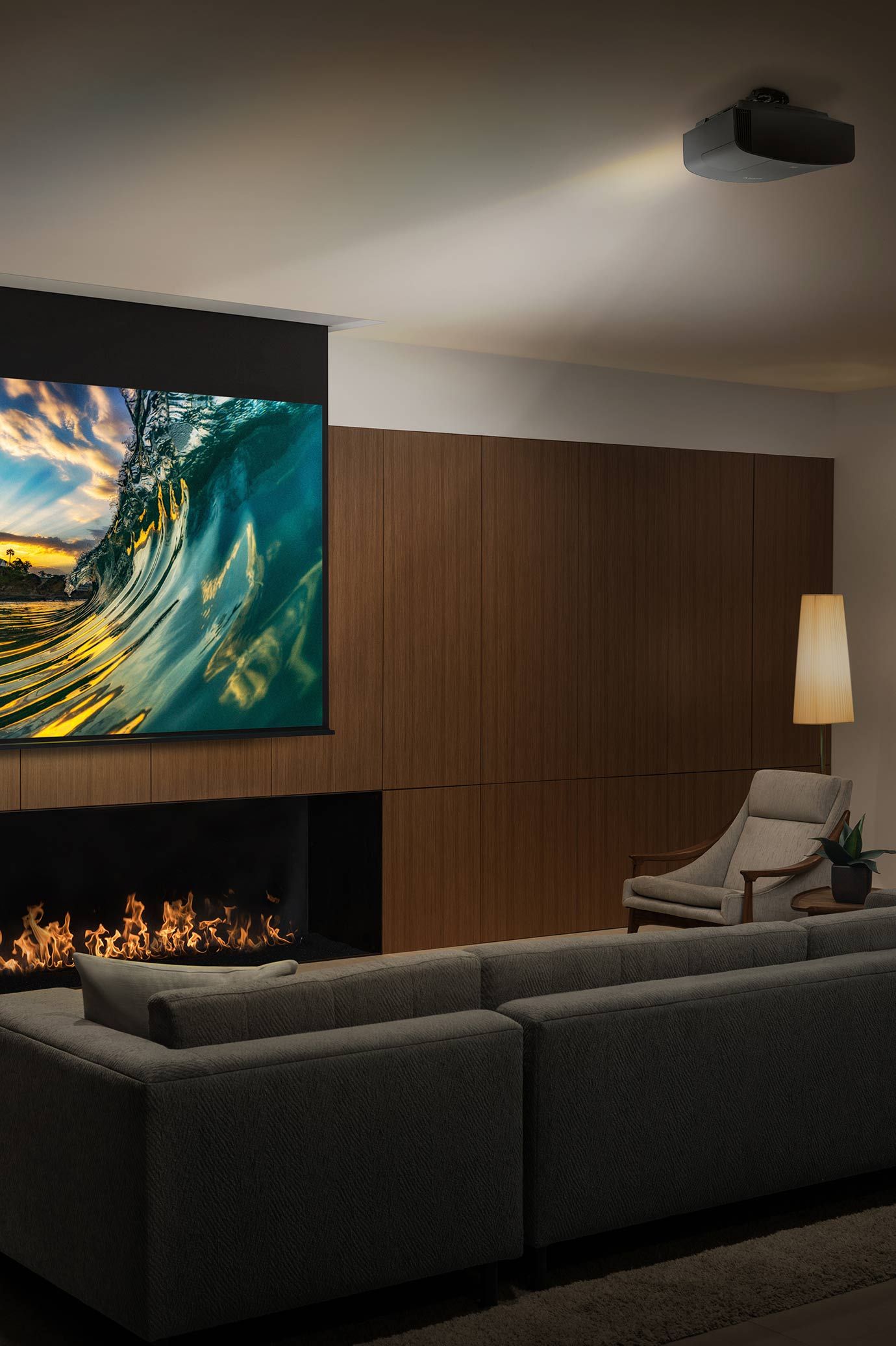 sony projector in a modern home with grey couch
