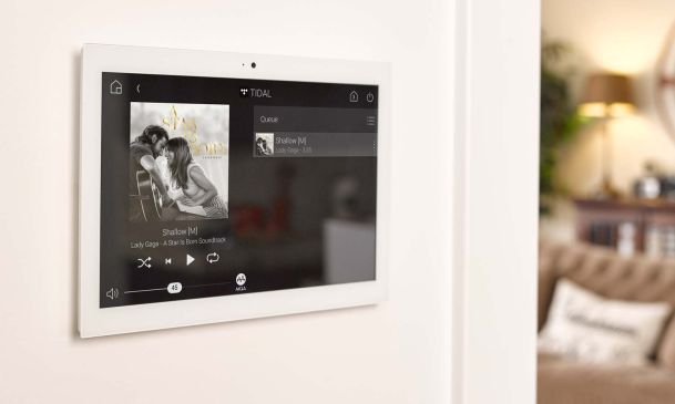 control4 media control from a white tablet on the wall