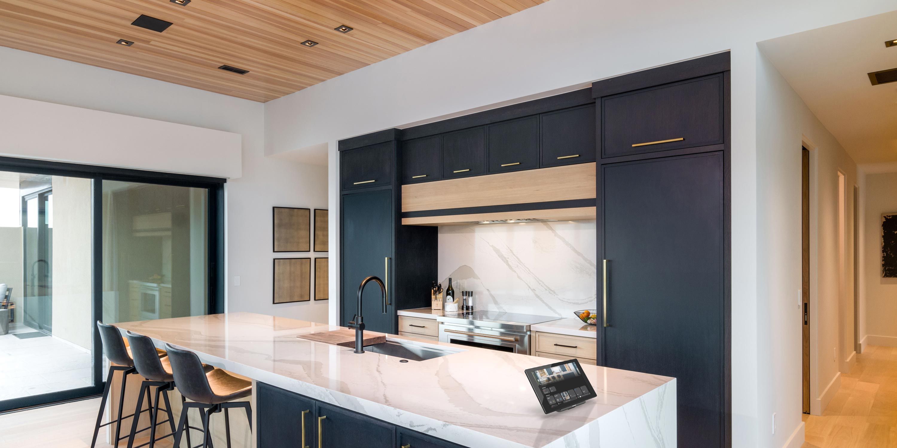 kitchen stock image with blue cabinets and blue green tiles